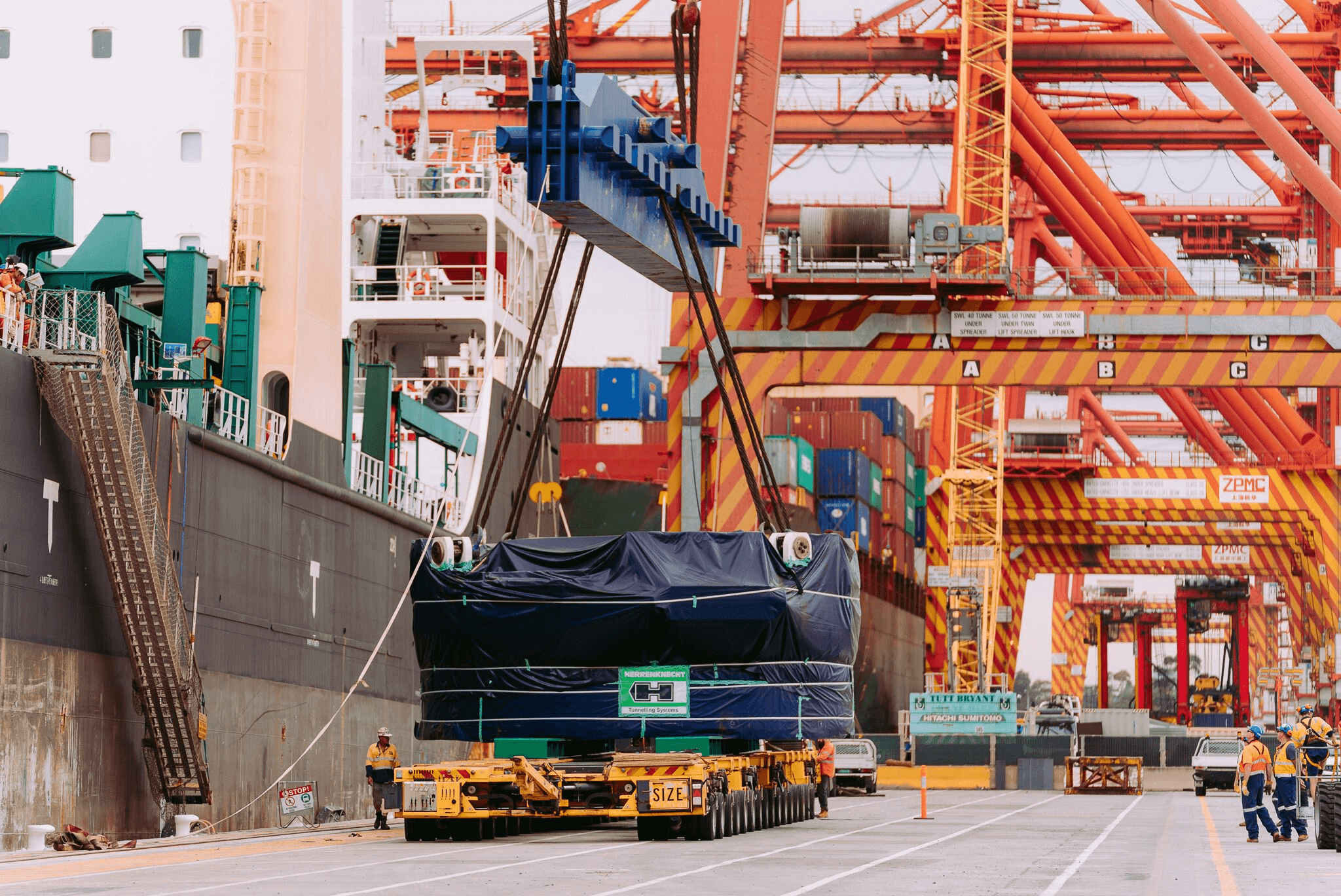 tunnel boring machine unloading at the port of melbourne for the west gate tunnel